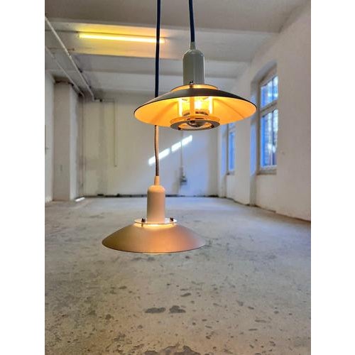 The Luna 8021 P pendant lamp from Danish manufacturer JEKA is a delicate lighting object that embodies the clean lines of...