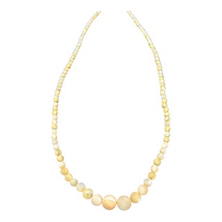 Burmese Hand Shapped Yellow Jade Round Necklace on Silk Cord For Sale