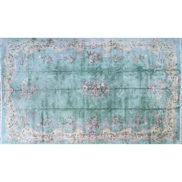 Step into a world of rare elegance with our exquisite Art Deco Rug, a true marvel from the 1950s that carries the allure...