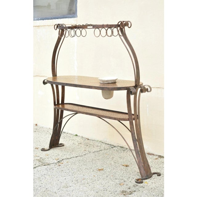 French Art Nouveau Brutalist Scrolling Iron Kitchen Island Bar Table. Item features (2) hand hammered copper surfaces,...