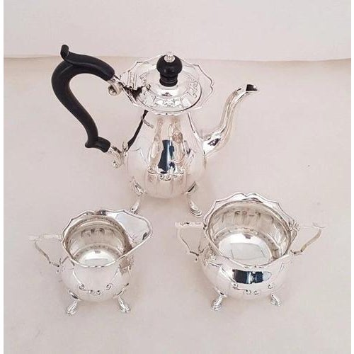 A fine English bachelor’s coffee service by the renowned Sheffield silversmiths James Deakin & Sons, fully hallmarked for...