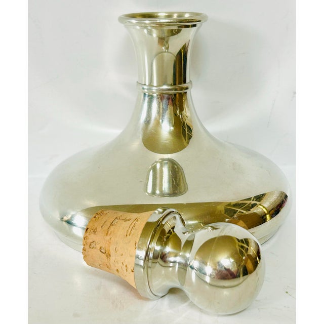 Made by Etains Du Manoir, Paris this has been styled in a 'ships' decanter style with a cork stopper. Keeps chilled...