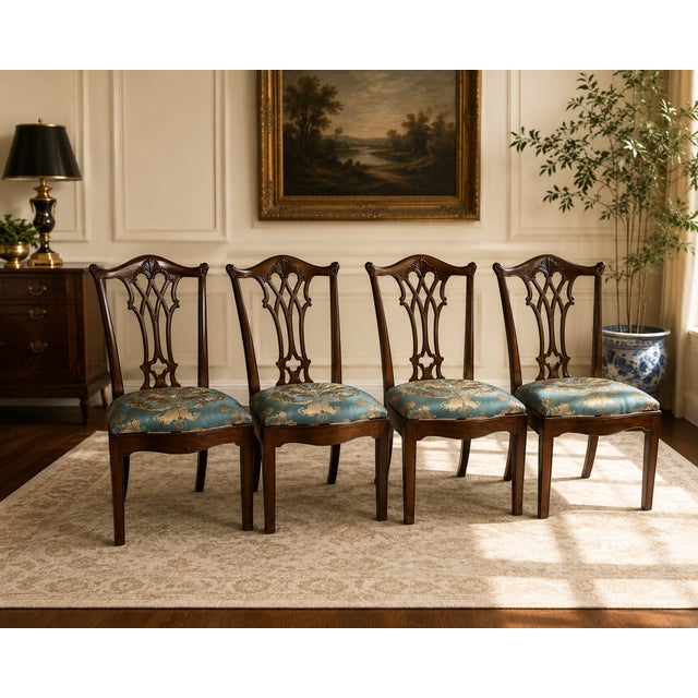 These four chairs, crafted approximately 15 years ago, showcase intricate carved details and exceptional craftsmanship....
