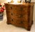 This elegant mid-20th century Italian inlaid French walnut Veronese style three-drawer chest was acquired more than 30...