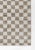 A modern classic is always in style. Part of the Kaia Collection, this playful beige and white check rug has been updated...