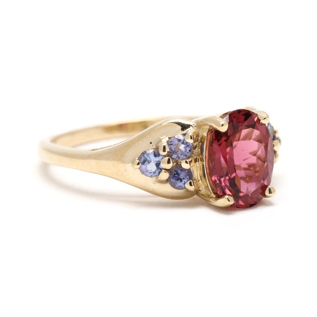 Stones: pink tourmaline, 1 stone oval cut 8 x 6 mm approximately 1.35 carat tanzanite, 6 stones round cut 2.25 mm...