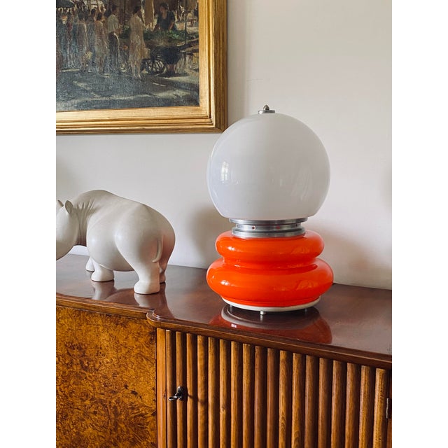 Space Age Murano glass table lamp. Attrib. to AV Mazzega, Italy 1970s Opaline white glass and orange glass. Chromed...