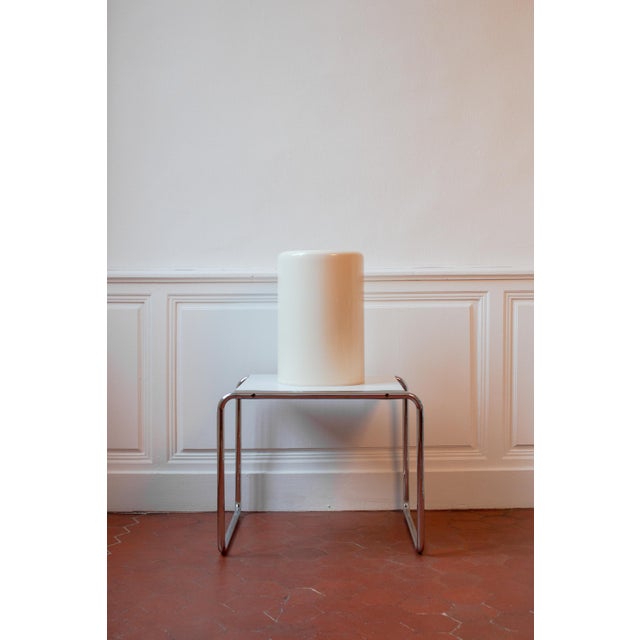 Minimalist, sculptural, and graphic, this umbrella stand, which can also be used as a wastebasket, is a creation by...