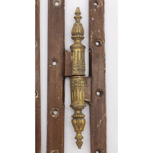 These olive paumelle door hinges are made of a brass barrel and steel plates with a patina finish. The barrel features...