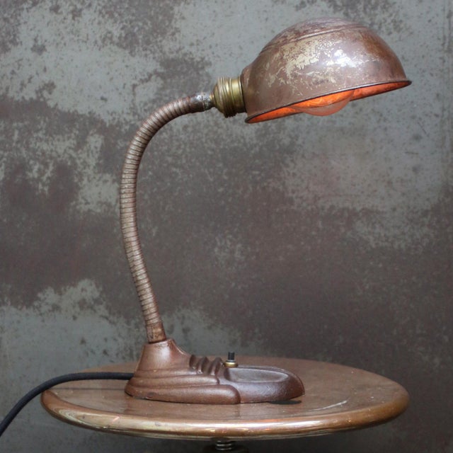Brown Art Deco goose neck desk light. Brass flexible arm with metal shade. cast iron base. black cotton wire and plug....