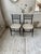 Set made up of two black chairs with woven rope seat. very beautiful general design, timeless and singular. reminiscent of...
