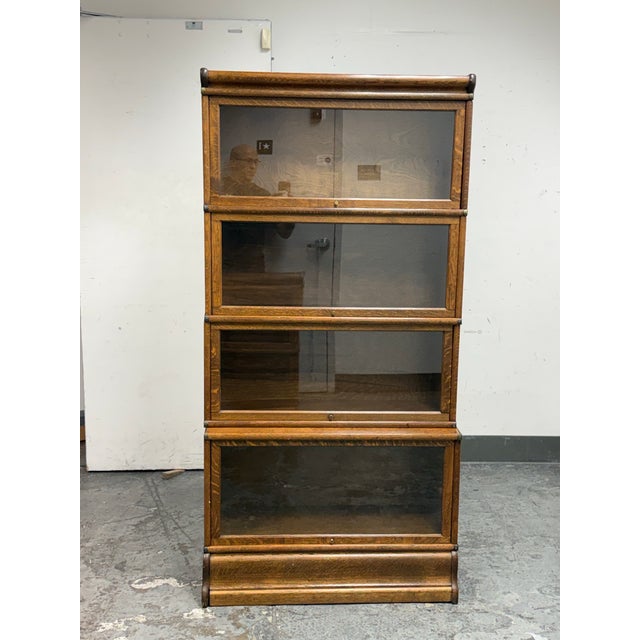 Design Plus Gallery presents a Circa 1930 Four Stack Barrister Bookcase by Globe-Wernicke. This classic barrister bookcase...