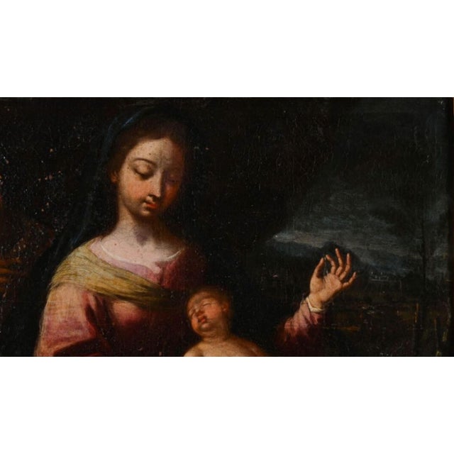 17th century Italian School "Holy Family with St. John the Baptist" Oil on canvas (Original canvas, restorations, missing...