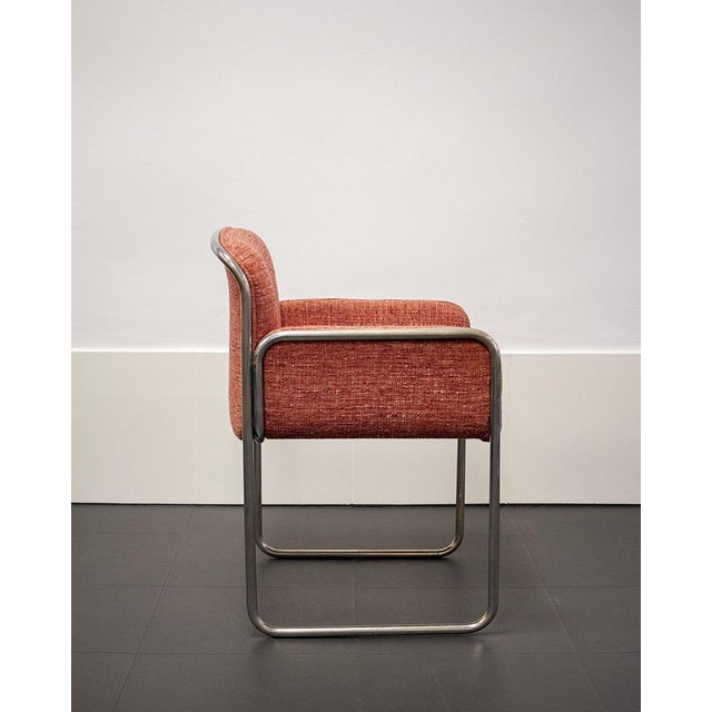Chrome-plated steel space-age style armchair from the 1980s. Reupholstered in beautiful tweed. In good condition but with...