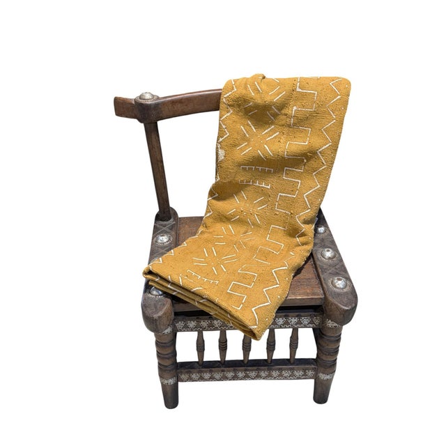 Authentic handwoven mud-cloth textile from Mali, crafted by artisans of the Bamana tribe. This striking cotton fabric...