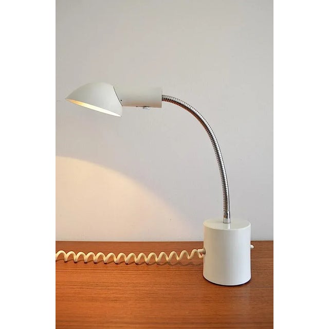 A special table lamp with original sticker from the 80s - 90s. The design of this lamp is from asger bay christiansen for...