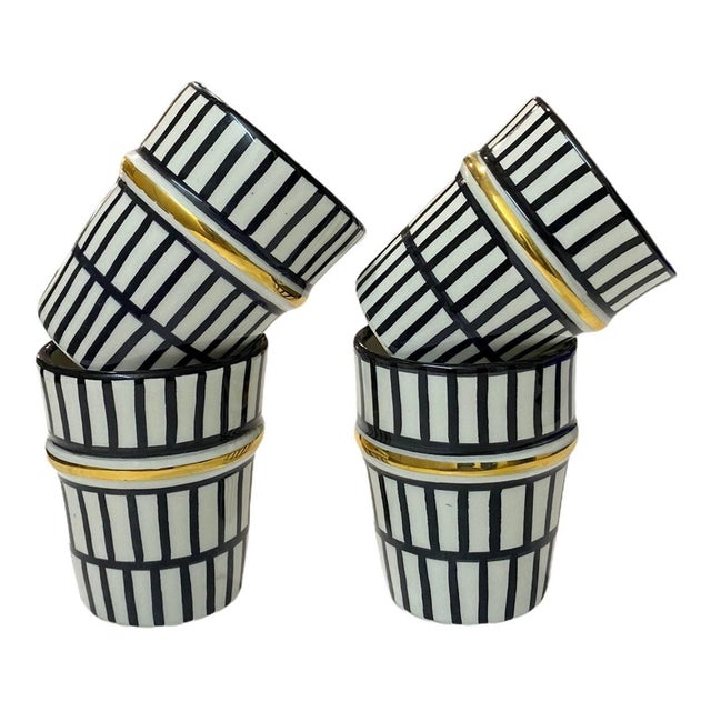 Set of 4 beldi glasses. Manufacturing: made and painted by hand in fez (Morocco) Motifs: Traditional Moroccan Zwak. The...