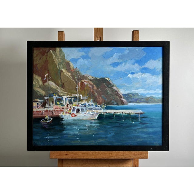 The painting "Ships on the Ferry" captures the essence of a peaceful coastal scene, where the shimmering blue waters of...