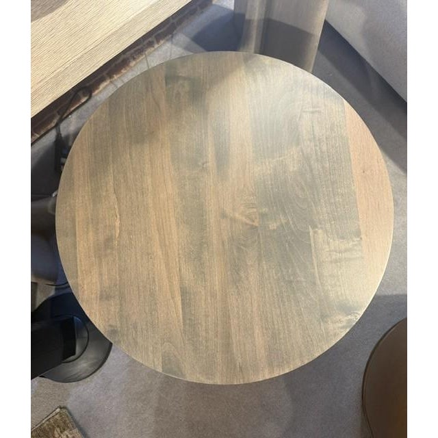 Though still pure and modern in form, the Round End Table add some curves to this angular collection. Four square legs are...