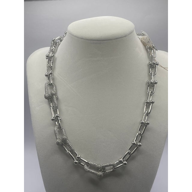 famous name chain small link necklace in silver with cz closure