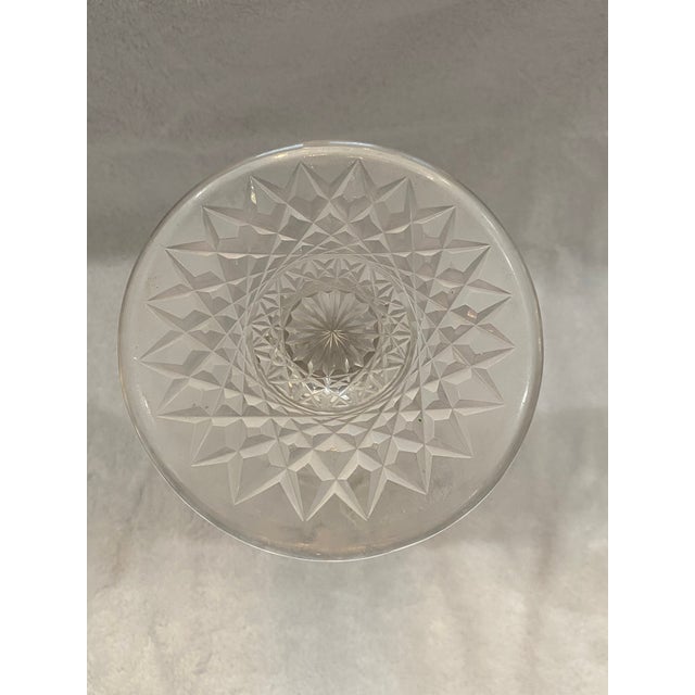 American Brilliance Vase that is in excellent condition. Age related appropriate wear on the bottom of the vase runs with...