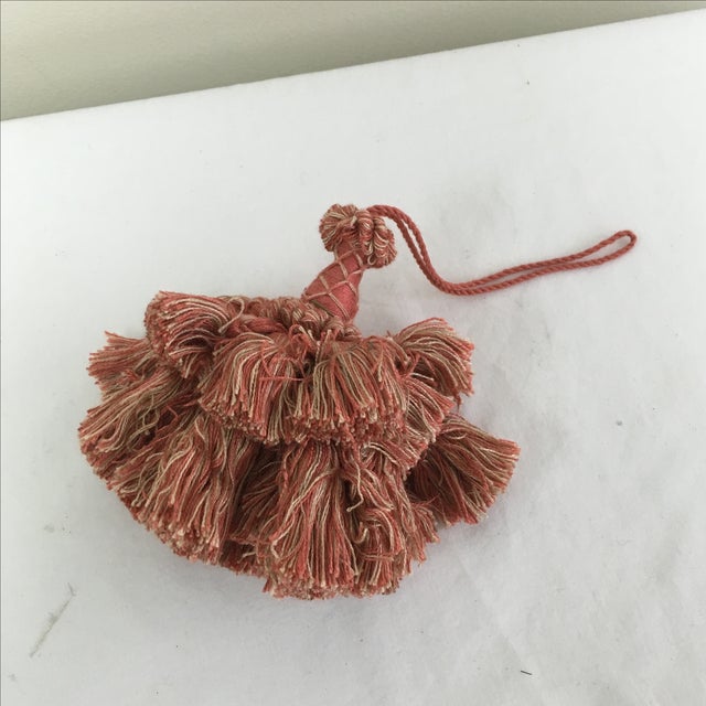 A lovely peach furniture tassel to adorn your curtain or key to a chest of drawers or armoire!