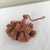 A lovely peach furniture tassel to adorn your curtain or key to a chest of drawers or armoire!