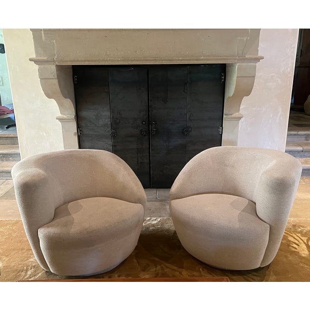 Vintage Nautilus Swivel chairs made in the 1980's. Each chair swivels 360 degrees. Attributed to designer Vladimir Kagan.