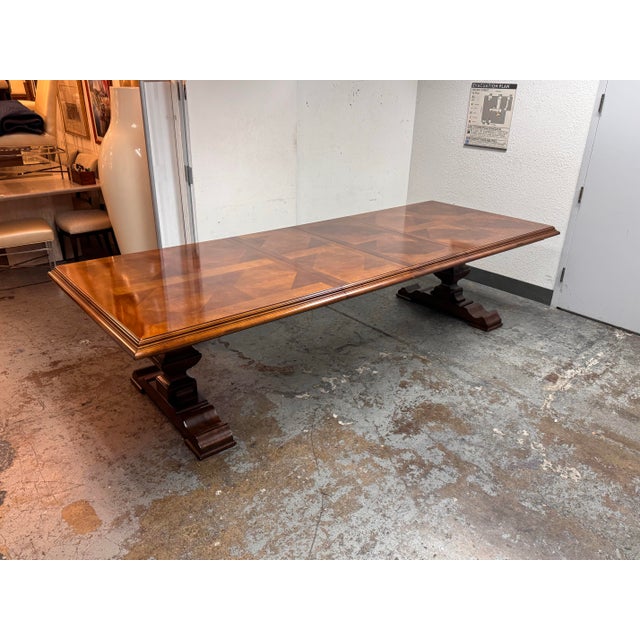 Design Plus Gallery presents the Trestle Extension Dining Table from Stanley Furniture. The rectangular top shows an...