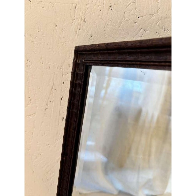 This vintage mirror from the 1950s is an understated and carefully crafted object that combines material, rhythm, and...