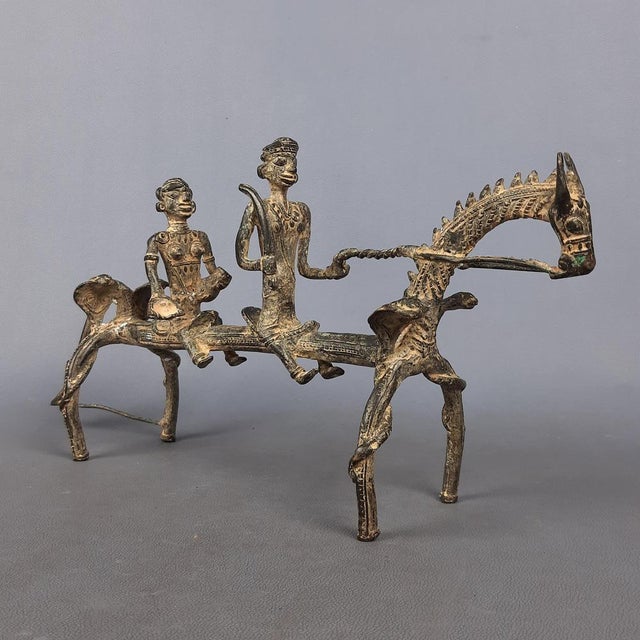 Ancient bronze sculpture, depicting a horse with 2 warriors, piece of African tribal art, made down to the smallest...