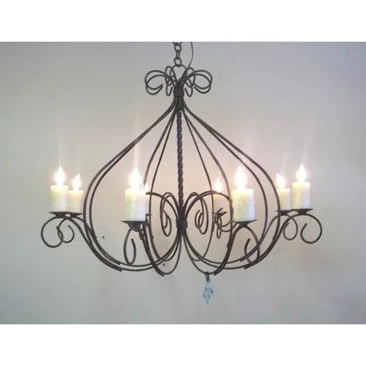 8 lights, scroll iron chandelier, farm newly wired. The farm house style & country style is enhanced by the 2"x2" beeswax...