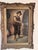 Charming antique European oil on canvas depicting a young violinist tuning his instrument. Executed in the academic genre...