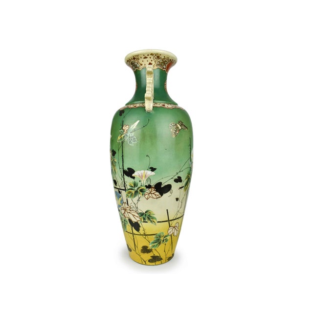 We are thrilled to present this rare remarkable incredibly exquisite tall hand painted Japanese urn style floor vase with...