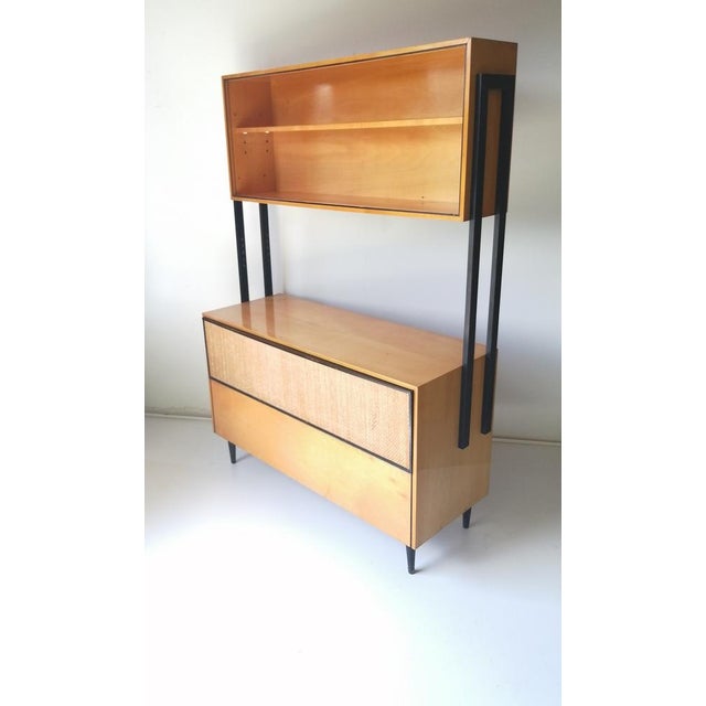 Mid-century wall unit with sliding glass door in great used condition. 172 cm tall wall unit features bottom cabinet for...