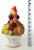 Offering a 1960s SMALL Italian porcelain hand painted topiary depicting a white basket filled with an array of fruits...
