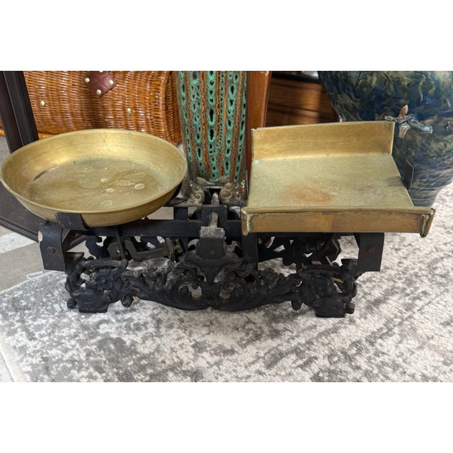 RARE Antique Cast Iron Balance Scale & 2 Copper Pans. Good condition working The product is a rare antique cast iron...