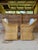 A beautiful pair of vintage woven rattan and wicker lounge armchairs featuring sculptural curved backs, gracefully sloping...
