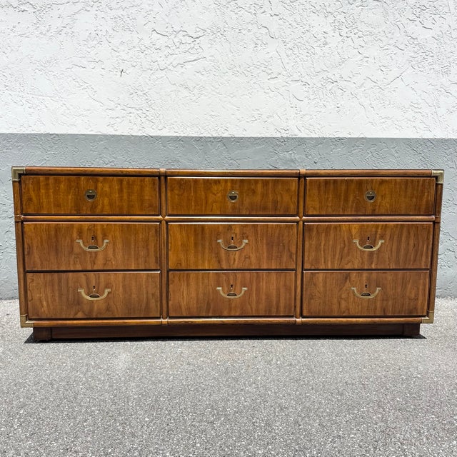A timeless piece from Drexel’s celebrated Accolade collection, this vintage campaign dresser embodies refined...