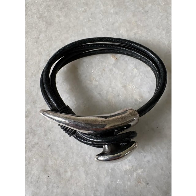 Vintage sterling silver and leather strap bracelet.