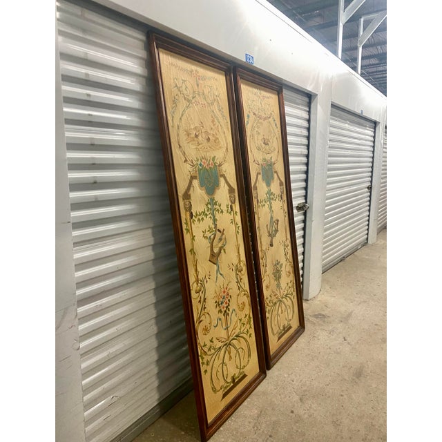 Napoleonic style decorated wall panels, manufactured by Theodore Alexander. These pieces consist of painted canvas set...