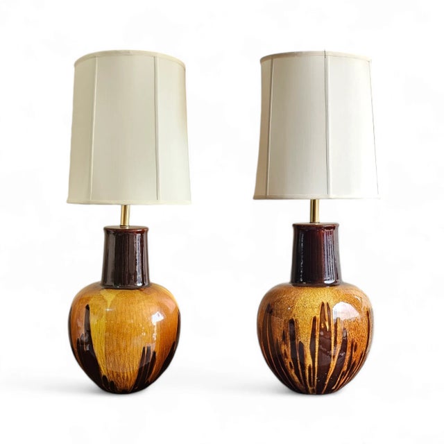 Extra large pair of vintage 1960s drip glaze ceramic table lamps. With a very active drip pattern, these lamps are fitted...