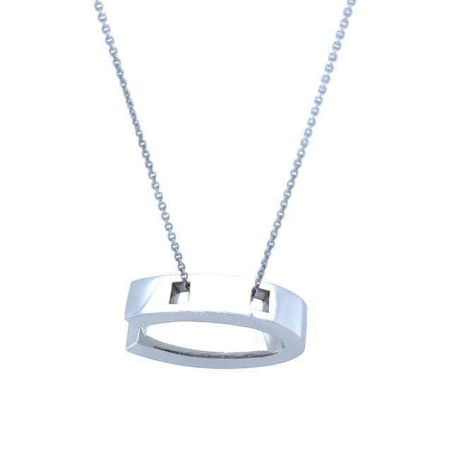 A refined and contemporary Canturi alphabet initial pendant necklace crafted in 18ct white gold. This elegant piece...