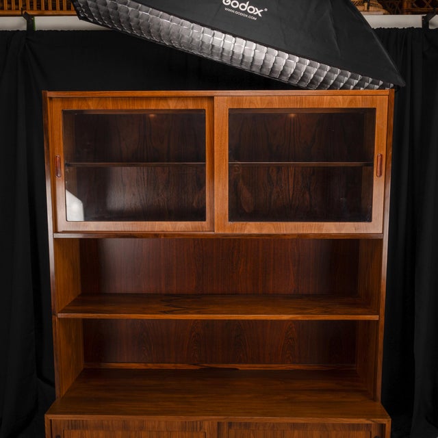 Amazing Danish Modern rosewood bookshelf hutch by Poul Hundevad! Gorgeous rosewood veneer in great condition. A wonderful...