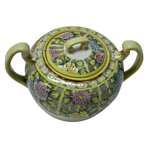Hand-painted porcelain sugar bowl in mint condition. Marked "Nippon" at the underside