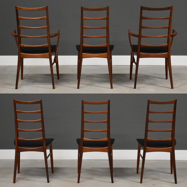 A beautiful set of six mid century modern rosewood high back Lis dining chairs with horiontal slatted ladder backs...