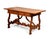 This is a wonderful side or writing table in solid walnut that perfectly adheres to the Baroque aesthetic. The carved...