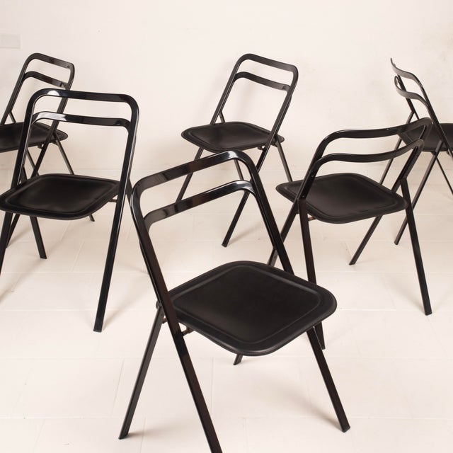 Iconic series of folding chairs model Clio, designed by Giorgio Cattelan and produced by Cidue in the 1970s, made of black...