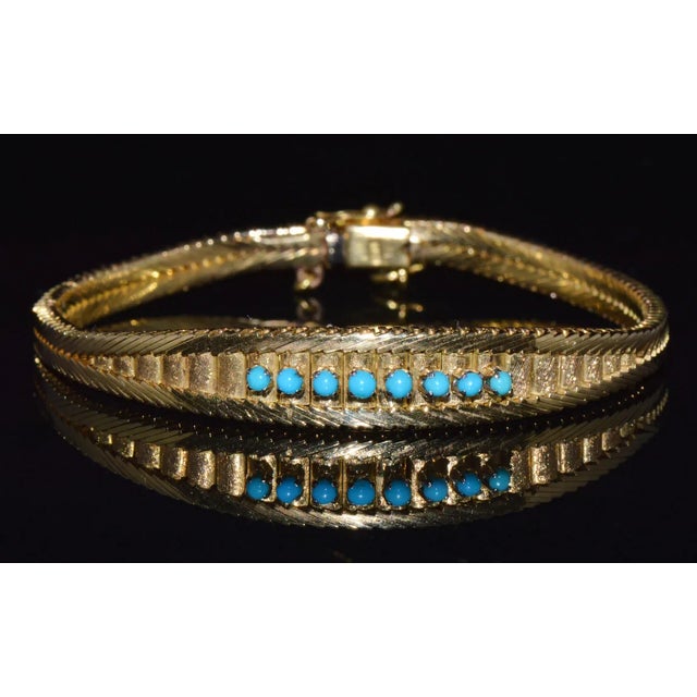 Vintage 18K solid gold turquoise gems bangle bracelet. This bracelet has a gorgeous, extremely fine, smooth and textured...
