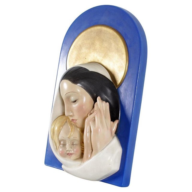 "Madonna and Child" by Otto Maraini for Lenci, Italy 40s. High relief in cast ceramic, glazed in polychrome. Signed lower...